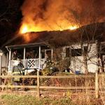photo by Adrian Mosby of a house fire in Charleston.