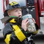 photo by Chris Dorst of a child raising money to help others in Charleston.