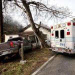 photo by Lori Wolfe of a vehicle into a house in Huntington WV.