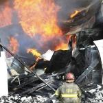 photo by Rick Barbero of an auto parts store fire in Sophia WV.